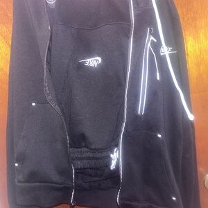 Nike Black Jogging Suit with White Detailing and hidden pockets